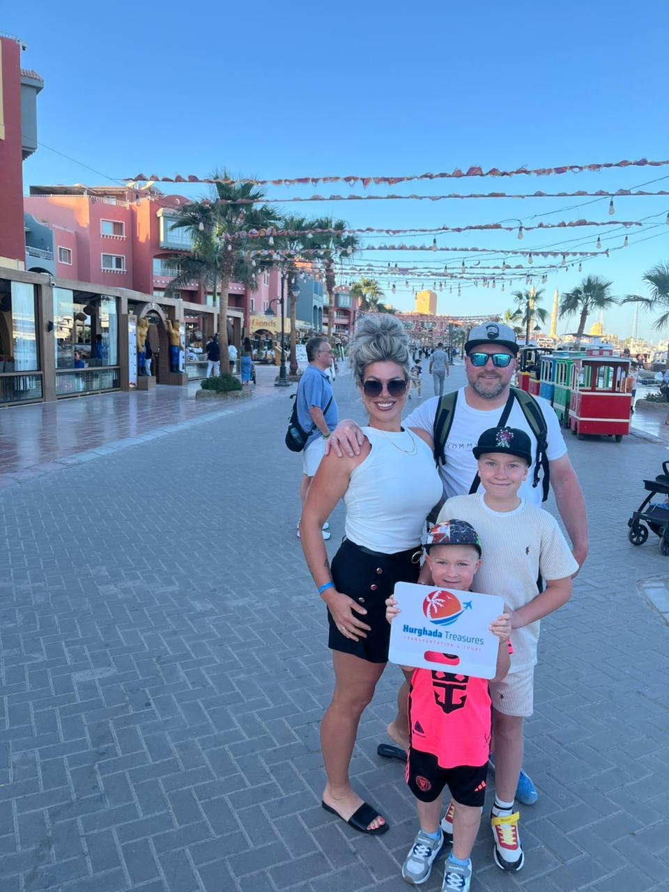 Guests of Hurghada Treasures on the marina promenade after a private city transfer