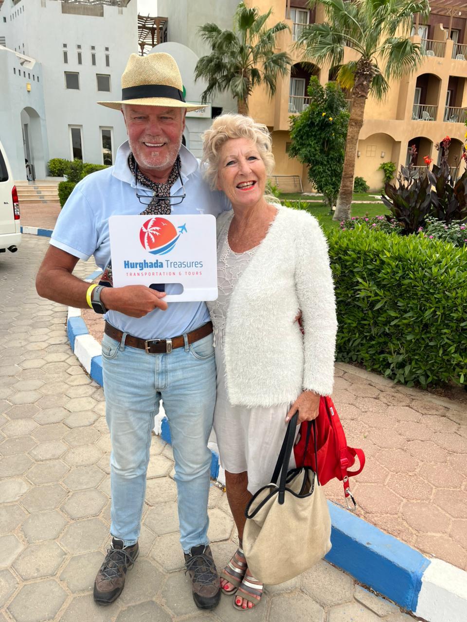 Couple ready for their private hotel transfer at Lemon & Soul Makadi Bay